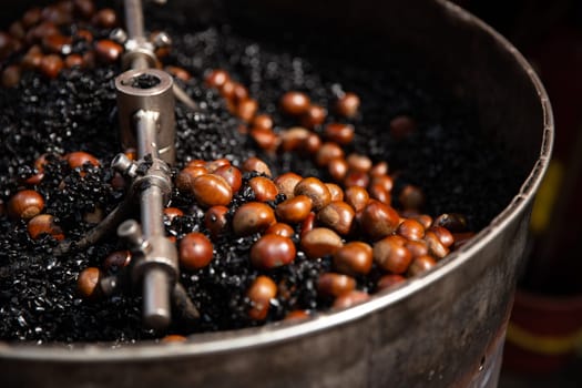 Close Up of Chestnuts roasting on coal