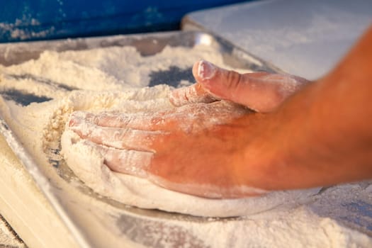 Home made Kneading Dough for a Pizza