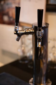 Duo beer tap at a bar unlabeled