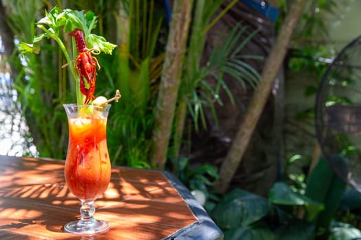 Crawfish bloody mary with celery and a frawfish