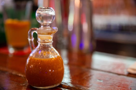 Housemade hot sauce at a Creole place