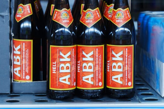 Tyumen, Russia-March 02, 2024: ABK lager beer bottles close up supermarket shelf