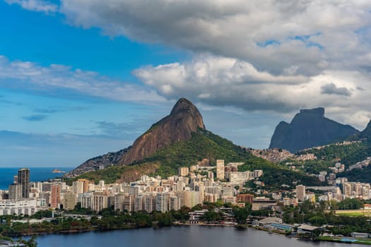 Luxury Rio skyline near Lagoa with Rocinha favela and Pedra da Gavea in sight.