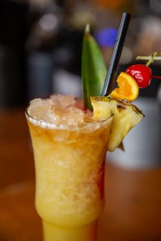 Tropical Mai Tai served with fruit garnish