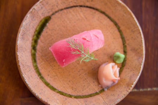 Fresh tuna sushi with ginger and wasabi