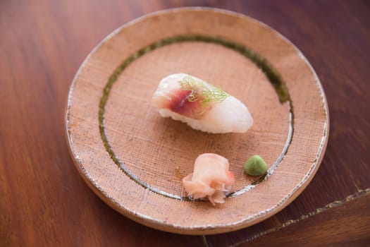 Fresh Hamachi Sushi with ginger and wasabi