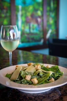 Caesar Salad with Wine Vertical in a restaurant