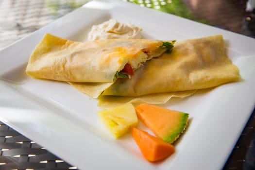 Crepe Stuffed with Eggs, bacon, spinach and cheese