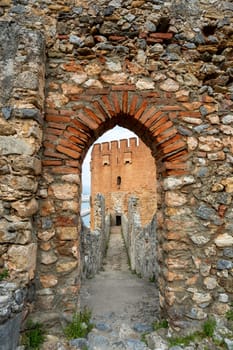 The historical Red Tower in the Alanya district of Antalya, one of the touristic regions of Turkey. Turkish name Kizil Kule