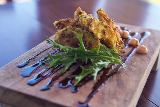 Fried avocado fries with eel sauce and mayonnaise