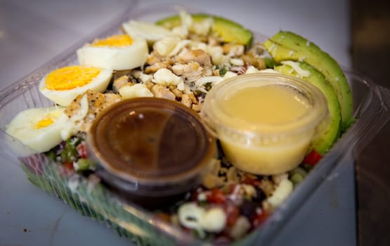 Southwest chicken and egg saled for lunch with balsamic dressing