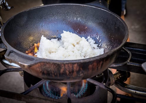 Frying white rice in a cast iron pan