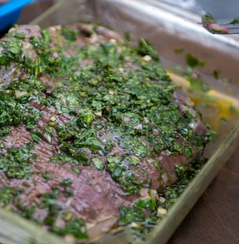 Marinated steak with herbs and seasoning