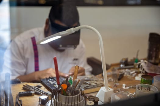 Artisan Work shop Man repairing a watch