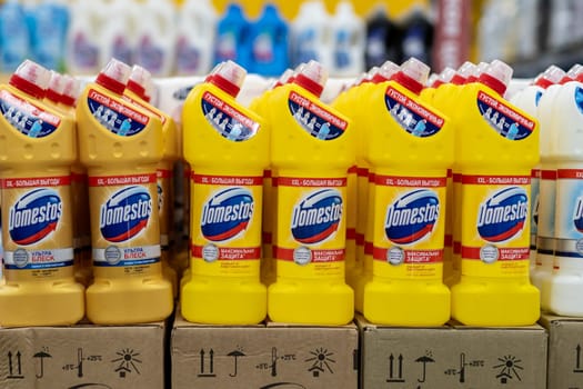 January 25, 2024, Kemerovo, Russia. Supermarket shelves are filled with a long row of bottles of Domestos. Disinfectant, toilet cleaner and disinfectants. Kills viruses.