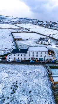 PORTNOO, COUNTY DONEGAL, IRELAND - JANUARY 17 2023 : The shop is located close to the harbour.