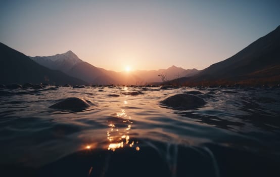 Mountain landscape at sunset. The sun goes down over the mountains.