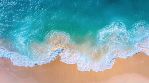 An aerial view of a beach with waves and sand