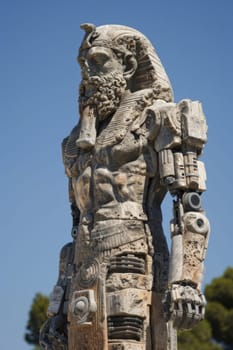 a fictional statue of a large stone sculpture with many gears on it