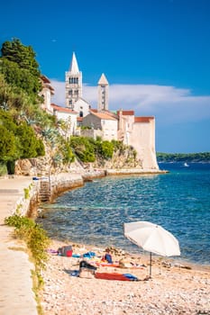 Historic town of Rab towers and beach walkway view, archipelago of Croatia, Dalmatia