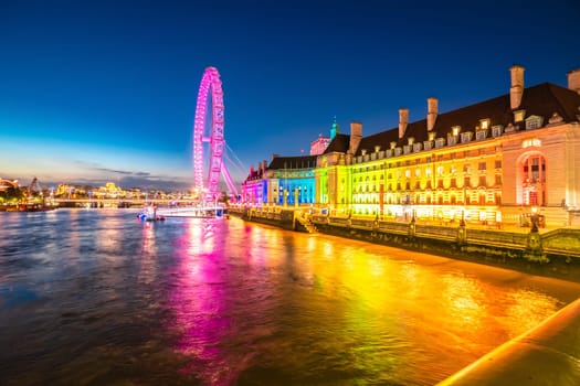 Giant ferris wheel on Thames river in London evening view, London eye in capital of UK