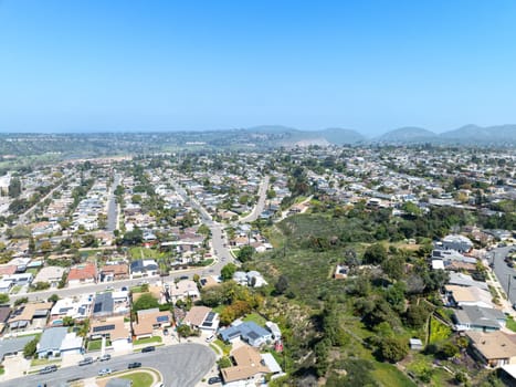 Aerial view of house with blue sky in suburb city in San Diego, California, USA.