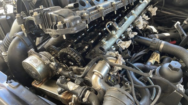 Close-up of camshafts and deposits on a diesel engine caused by EGR.