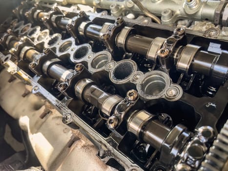 Close-up of camshafts and deposits on a diesel engine caused by EGR.