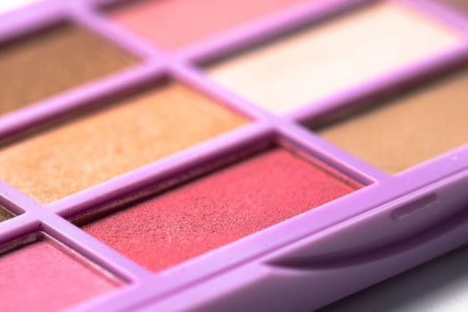 Cosmetic makeup eyeshadow. Different color. Beauty accessories. Close-up macro shot