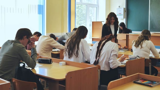 High school students sitting at a desk