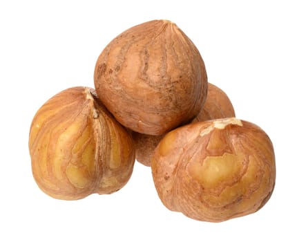 Three hazelnuts on isolated background, close up