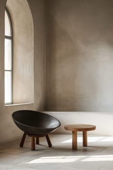 A black chair and table in a room with windows