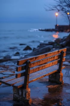 A bench sitting on a wet beach near the water