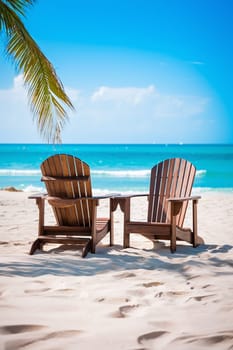 A pair of wooden lounge chairs facing the calm, turquoise sea on a pristine white sand beach under a clear blue sky - Generative AI