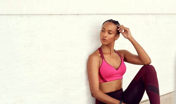 Black woman, thinking and exercise break in sportswear for fitness and healthy in New York. Lifestyle, female person and satisfied with self care or wellbeing in summer and confident with results.