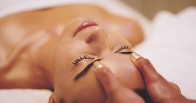 Spa, treatment and head massage for female client, scalp and health for stress relief. Skincare, beauty and luxury cosmetology for facial in salon, zen and relax for body care and beautician wellness.
