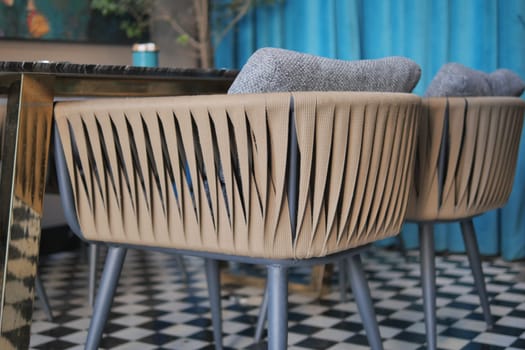 Two blue chairs on hardwood flooring