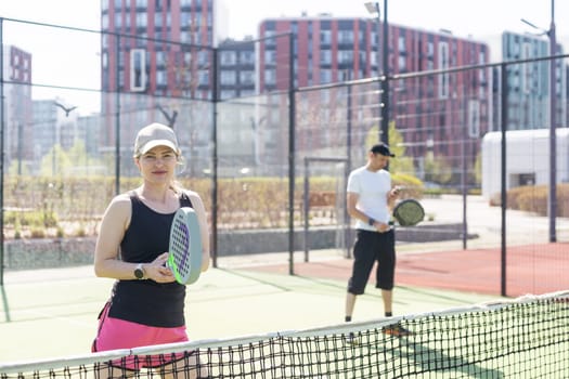 paddle tennis couple players ready for class. High quality photo