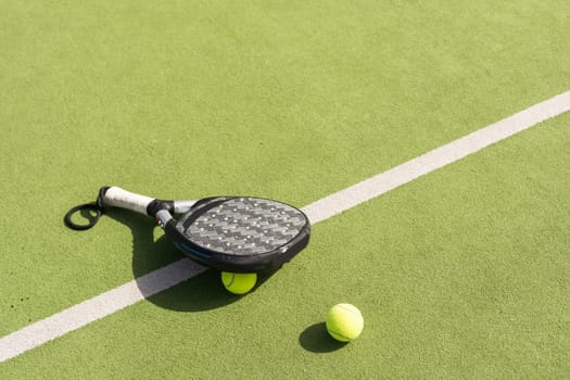 paddle tennis racket, ball. close- up on the racket. High quality photo