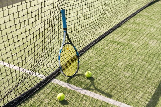 Tennis racket with a set of balls. High quality photo