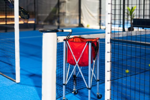 rackets and paddle balls on a court ready to play. High quality photo