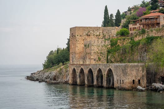 Historical Alanya Shipyard and Kizil Kule walls located in Alanya district of Antalya