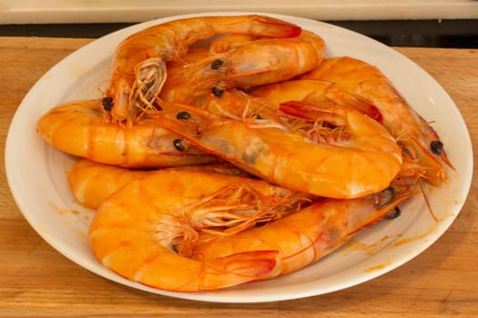 Experience the essence of Spanish cuisine with sizzling shrimp, a flavorful ingredient in the making of authentic paella