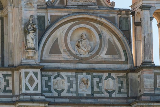 Close up of Certosa di Pavia monastery, details of the statue on the right side facade of the church,Pavia,Italy