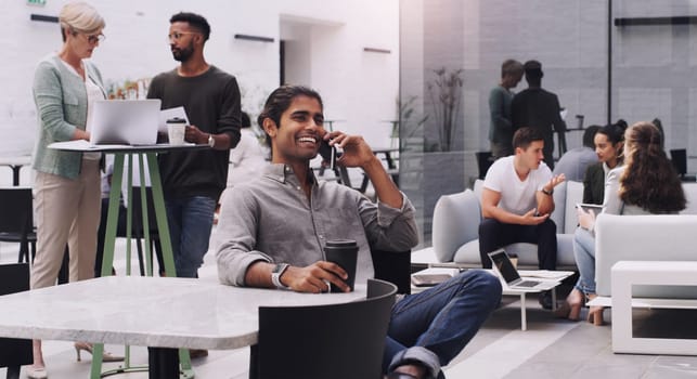 Businessman, phone call and smile in workplace for project, brainstorming and sitting on chair. Teamwork, meeting and communication in office for global startup company, research and digital agency.