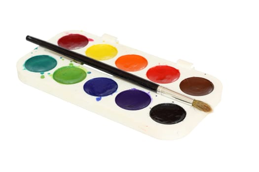 Watercolor paint and brush in white box isolated on white background.