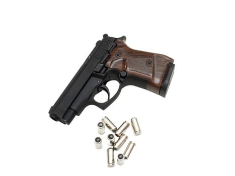 9mm pistol bullets and handgun isolated on white background.