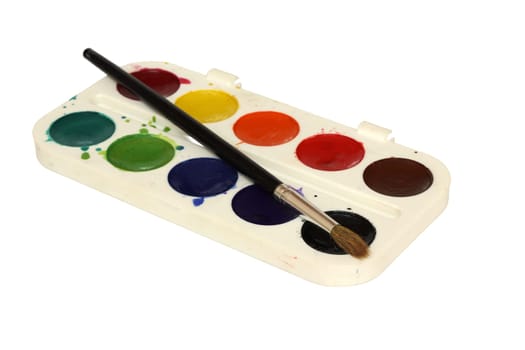 Watercolor paint and brush in white box isolated on white background.