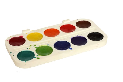 Watercolor paint and brush in white box isolated on white background.