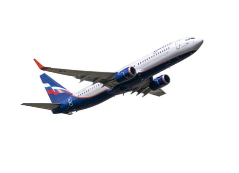 MOSCOW , RUSSIA, June 10, 2020: The Commercial passenger airplane flying overhead on sunny day on June 10, 2020 in Moscow, Russia.